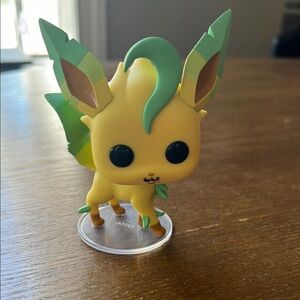 Pokemon Yellow and Green Creature Figure